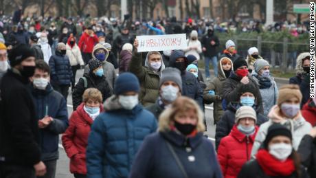 Supporters of the Belarusian opposition wearing face masks attend a rally to protest the results of the Belarusian presidential election in Minsk, on November 15th.
